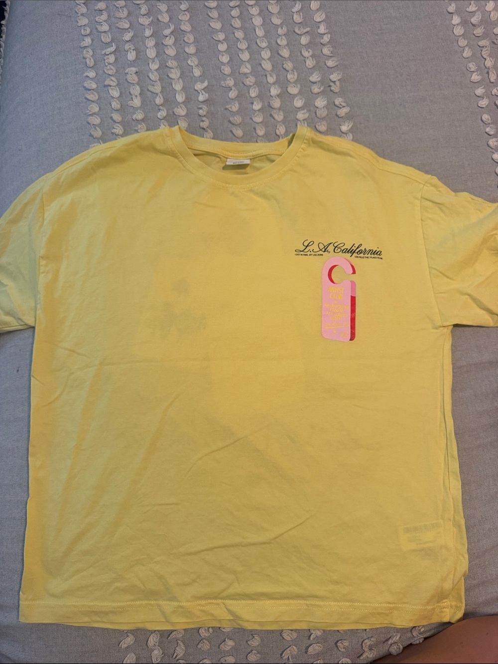Zara Yellow Short Sleeve Tee with Pink Tag Graphic